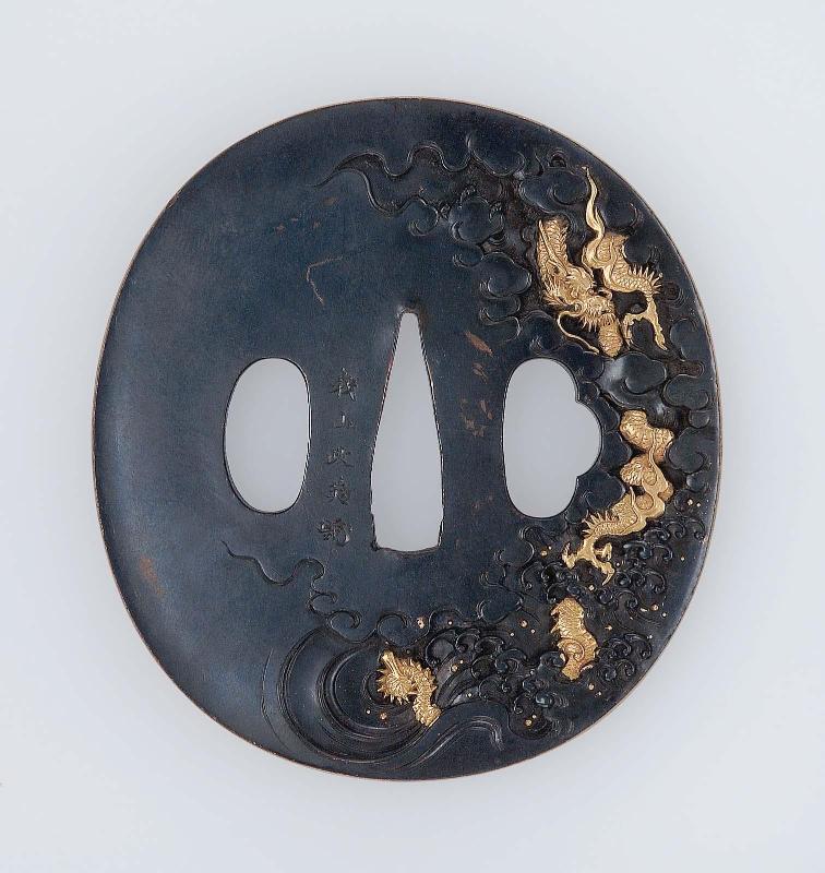 Tsuba with design of dragon and clouds