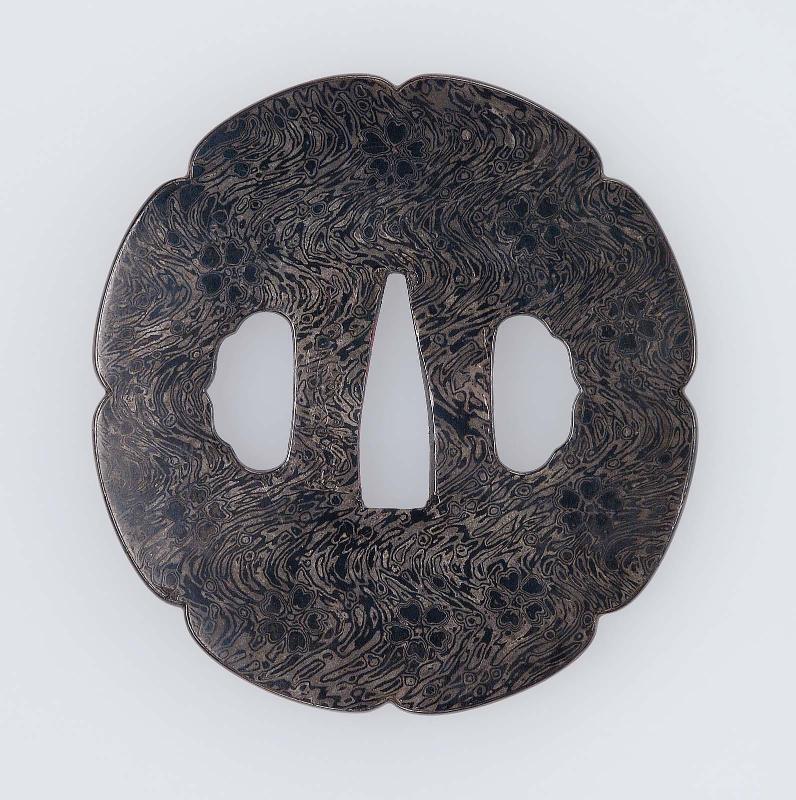 Tsuba with design of cherry-blossom floating on a stream