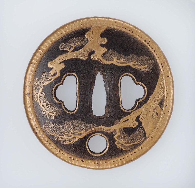 Tsuba with design of pines and kiri-mon