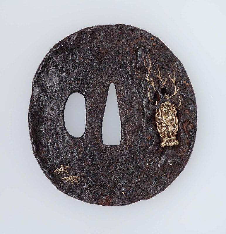 Tsuba with design of landscape with Fudo in a grotto