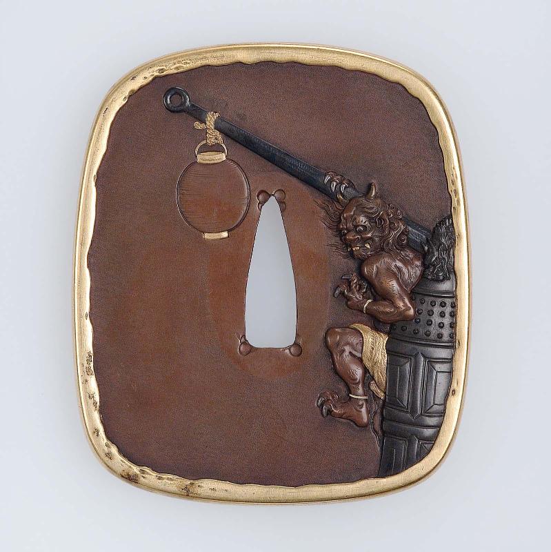 Tsuba with design of an oni carrying off a temple bell