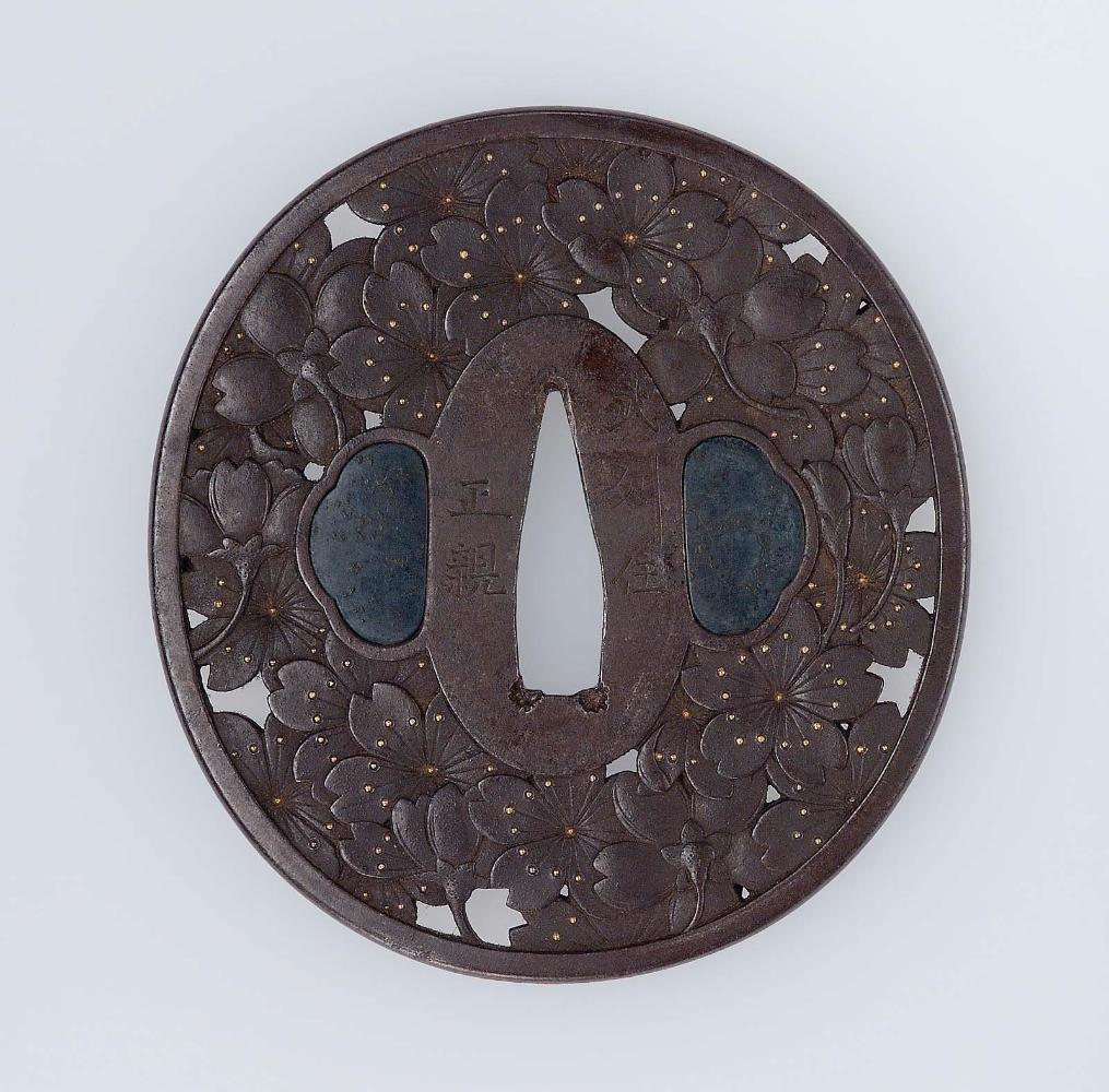 Tsuba with design of massed cherry blossoms