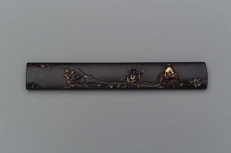 Kozuka with design of man on horseback and attendant