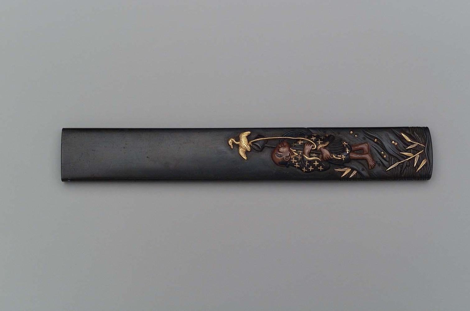 Kozuka with design of fisherman on land with his cormorant