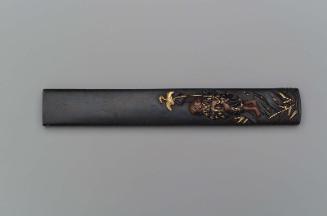 Kozuka with design of fisherman on land with his cormorant