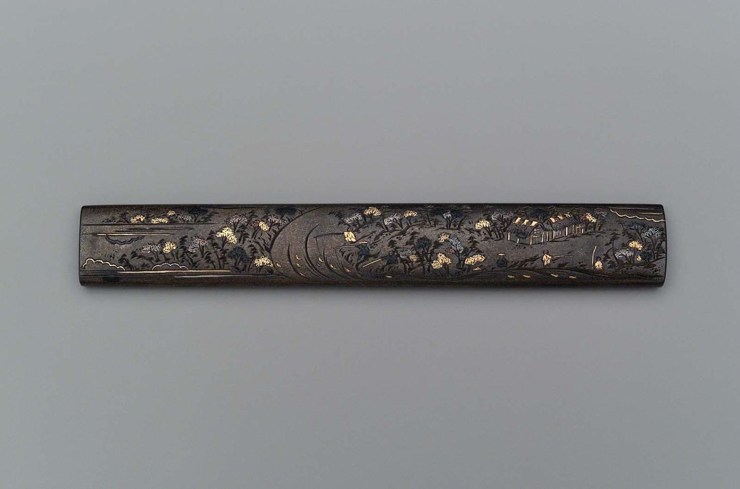 Kozuka with design of autumn landscape with trees, figures and river