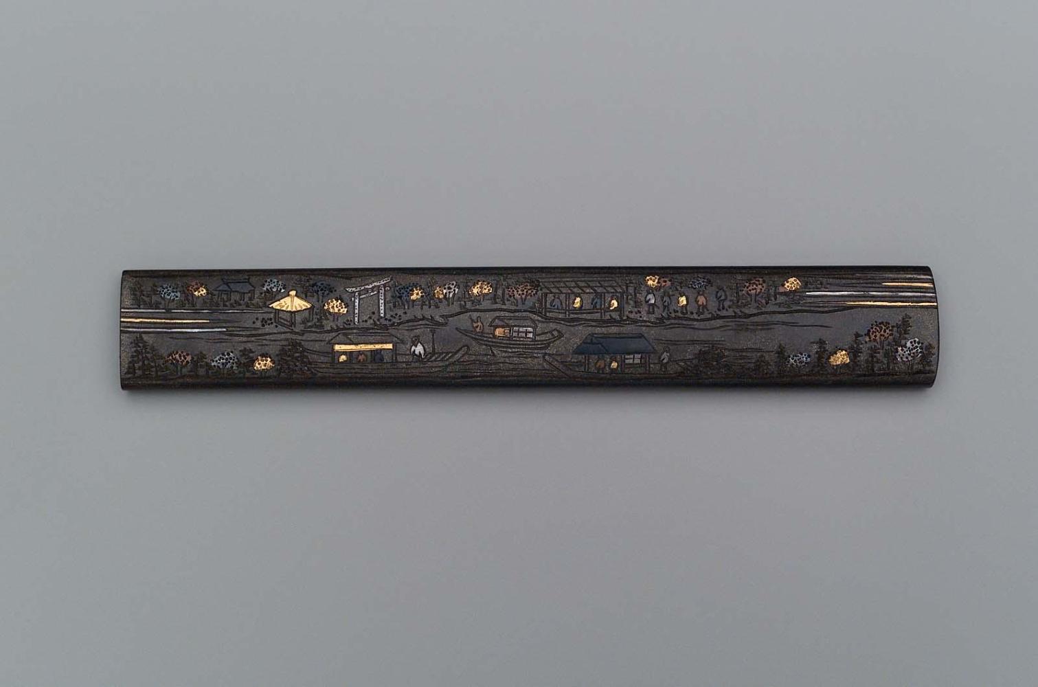 Kozuka with design of autumn landscape with a river, passenger boats and Shinto shrine