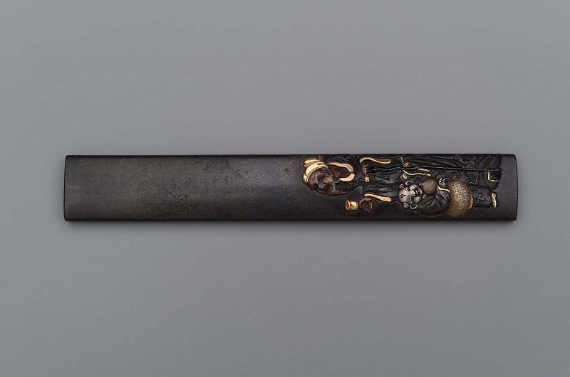 Kozuka with design of Chinese poet Rihaku (Li Bai) with an attendant