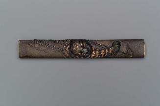 Kozuka with design of a tiger in the rain