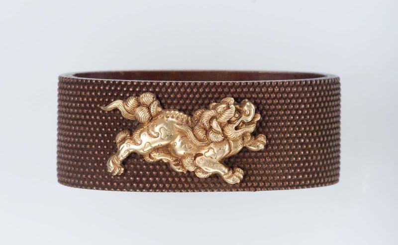 Fuchi with design of two shishi