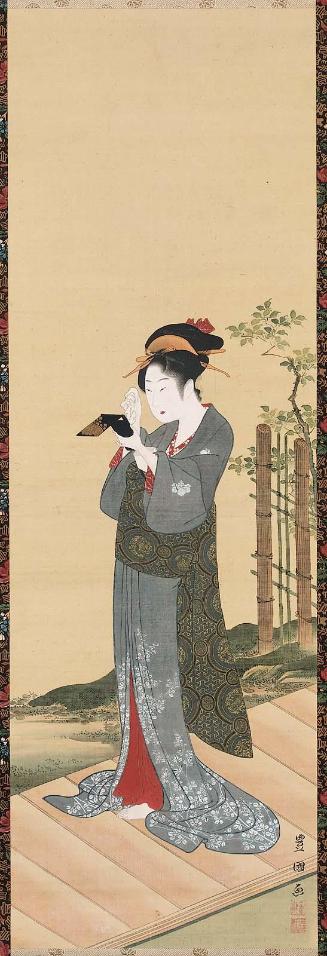 Woman Looking at Herself in a Hand-mirror