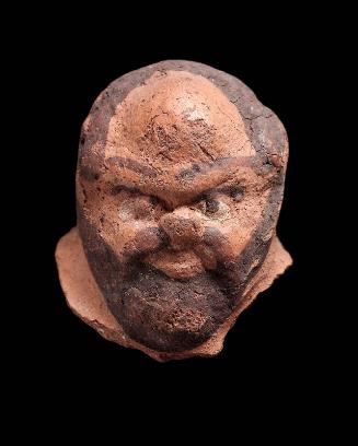 Decorative attachment from goblet in the shape of a satyr's head