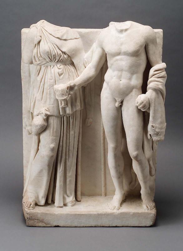 A maenad holding a wine pitcher and Dionysos with panther skin