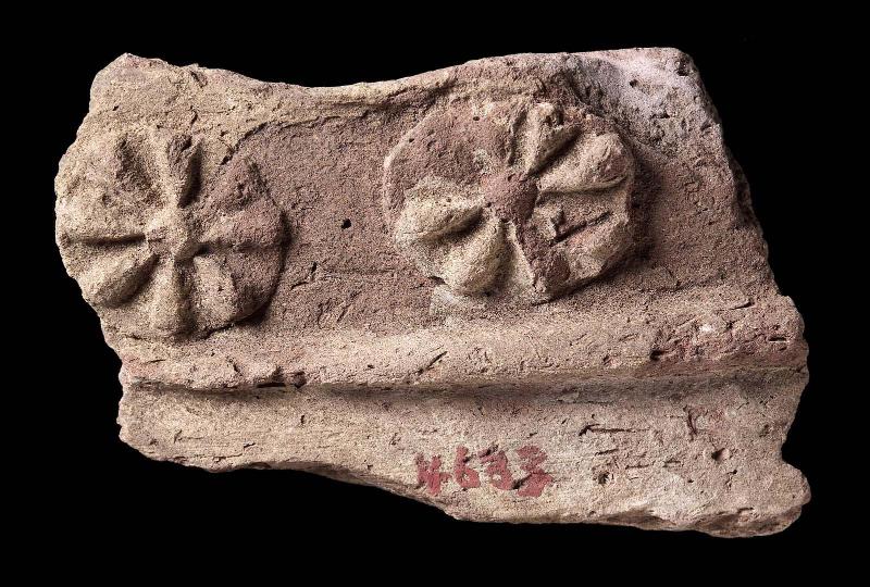 Fragment with two rosettes