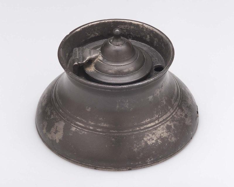 Inkwell with glass cup within metal housing