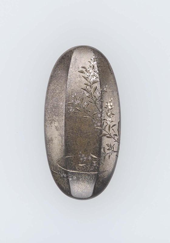 Kojiri with design of a flowering plant