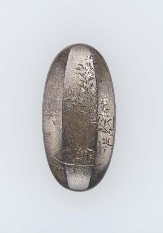 Kojiri with design of a flowering plant