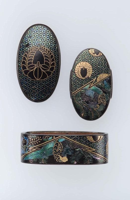 Fuchi-kashira and kojiri with geometric and floral designs