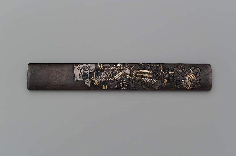 Kozuka with design of oni kneeling in supplication before Enma-o