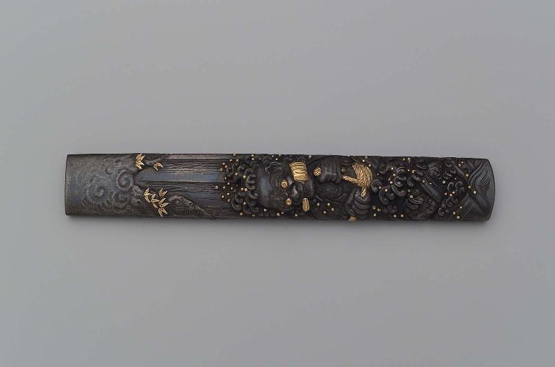 Kozuka with design of Endo Morito standing under a waterfall