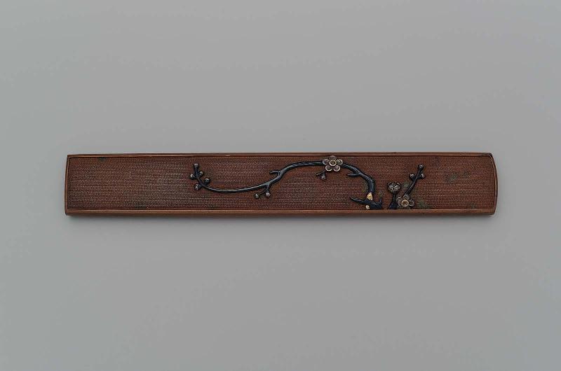 Kozuka with design of a branch of plum blossom