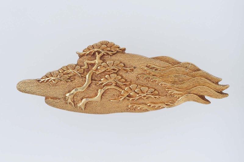 Menuki in the form of a pine-clad shore