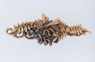 Menuki in the form of a wasp on a flowering branch
