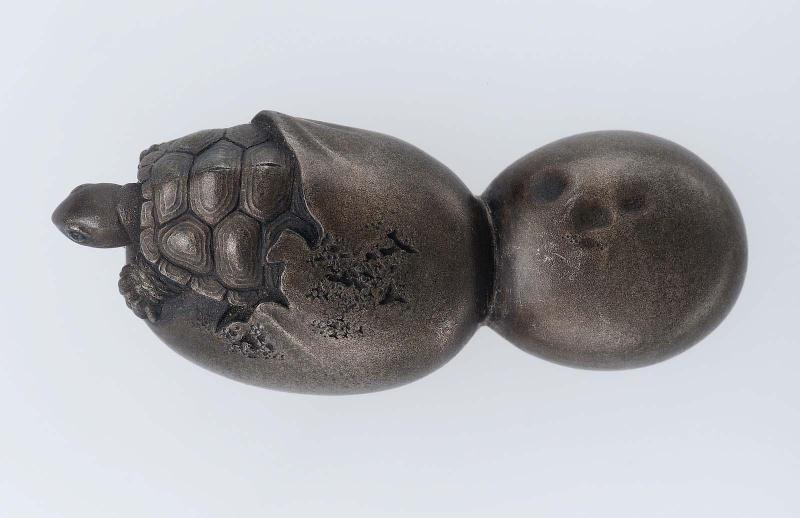 Menuki in the form of a turtle emerging from a gourd