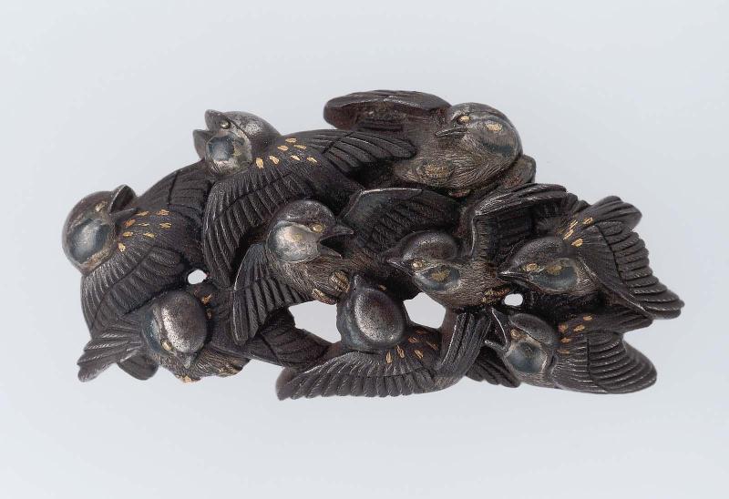 Menuki in the form of a flight of sparrows