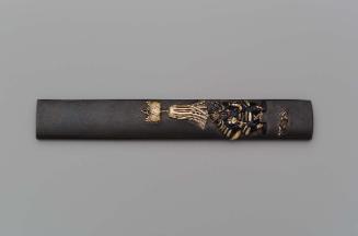 Kozuka with design of seated general with banner