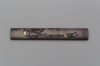 Kozuka with design of Shoki lowering an oni down a cliff to recover his sword