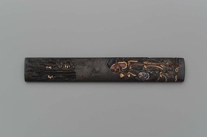Kozuka with design of Chinese poet Li Bai (Rihaku) and an attendant by a waterfall