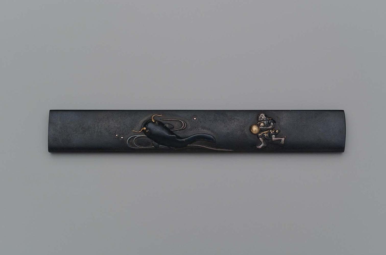 Kozuka with design of a figure fruitlessly attempting to catch a catfish with a gourd (hyotan namazu)