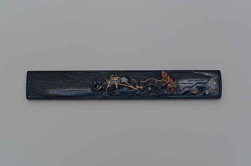 Kozuka with design of farmer plowing with a water-buffalo