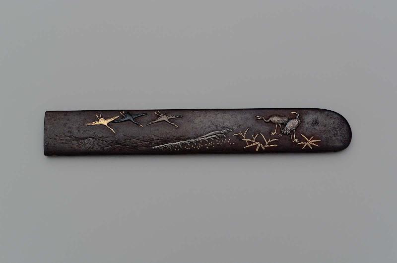 Kozuka with design of cranes, waves and reeds