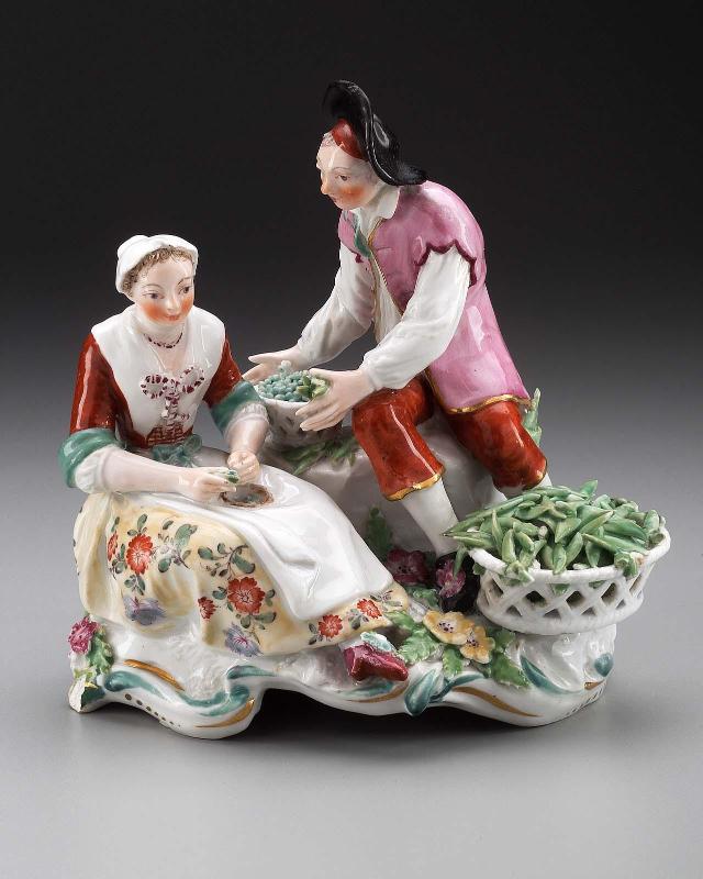 Boy and girl shelling peas