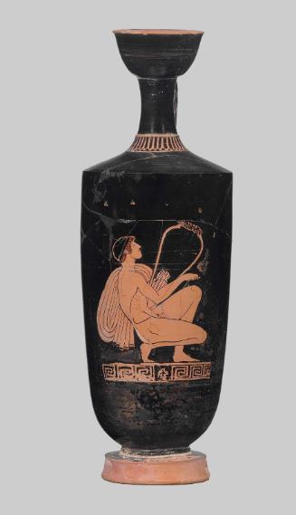Oil flask (lekythos) with youth playing lyre