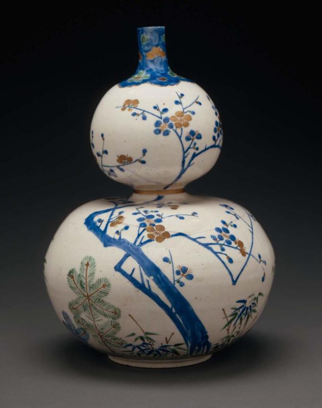 Sake bottle in double gourd shape with design of pine, bamboo and plum blossoms