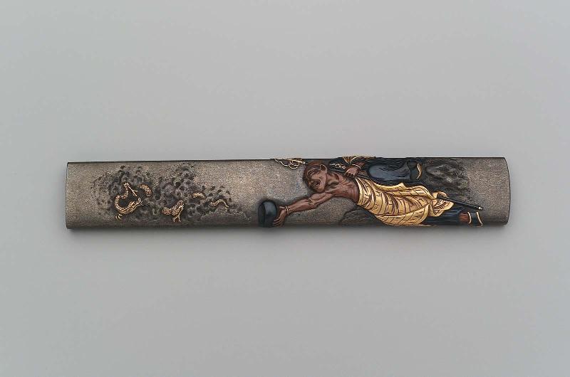 Kozuka with design of Handaka Sonja producing a dragon from a bowl