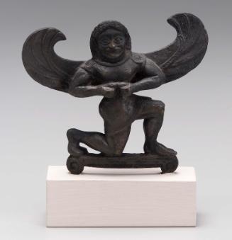 Figurine of a winged gorgon, probably a dinos rim attachment