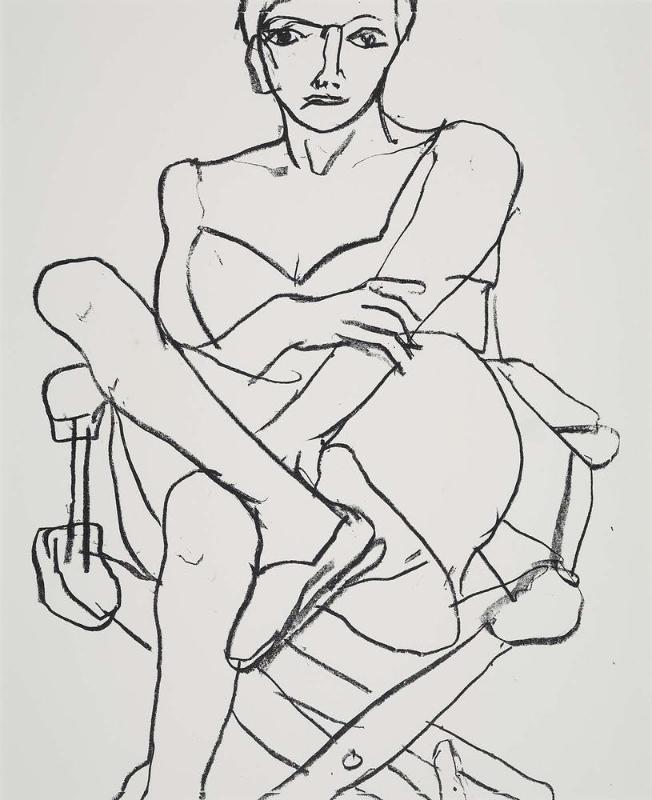 Seated Woman in Director's Chair