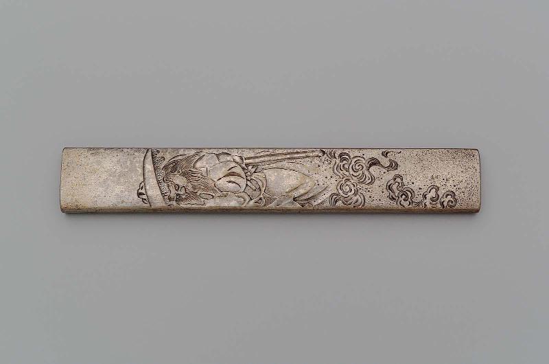 Kozuka with design of Shoki standing on a cloud