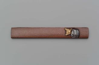 Kozuka with design of bird on a tea-grinder
