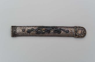 Kozuka in the form of a sword handle with menuki in the form of a dragon