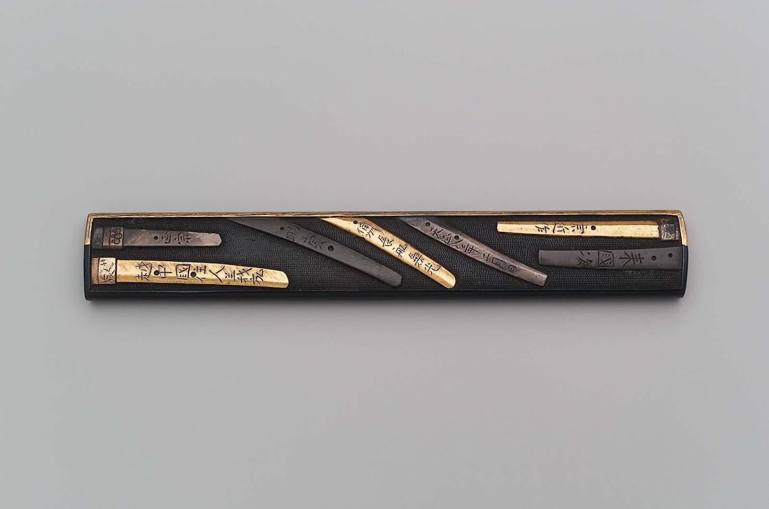 Kozuka with design of sword tangs