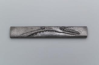 Kozuka with design of a bridge and village under snow