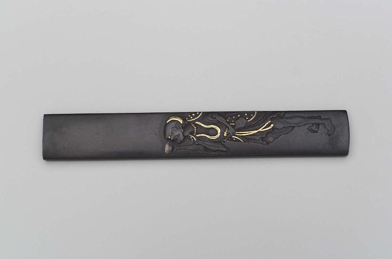 Kozuka with design of a sennin holding a stone and gourd