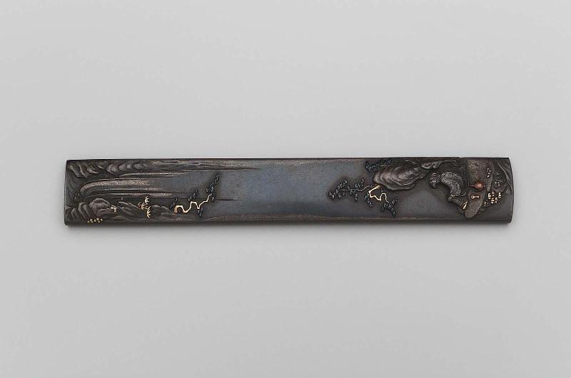 Kozuka with design of Rihaku (Li Bai) contemplating a waterfall