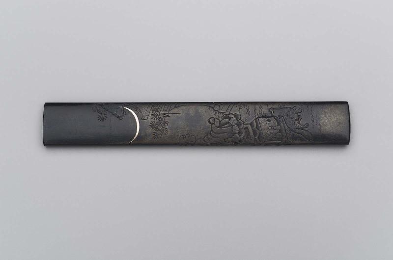 Kozuka with design of a priest with a sacred jewel and squirrel by a temple lantern