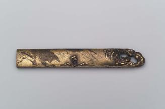 Kozuka with design of figure of a horse passing through an opening in the kozuka